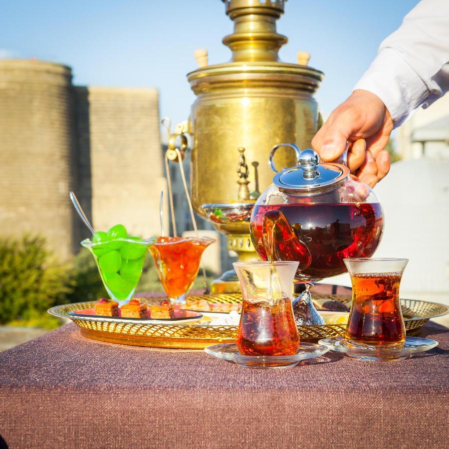 Promenade Hotel Баку Экстерьер фото Tea in traditional glasses